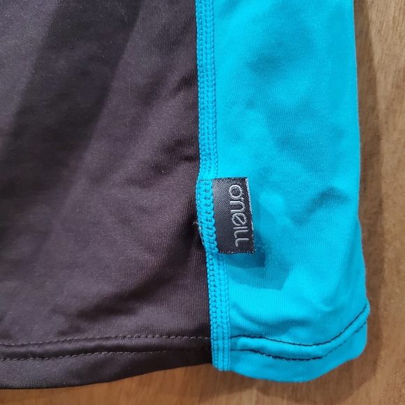 O'NEILL BROWN AND TEAL SHORT SLEEVE RASH GUARD SIZE SMALL - Picture 5 of 12